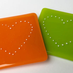 Colourful handmade glass table coasters in a variety of styles and colours