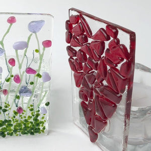 Quirky glass candle holders in a range of designs.